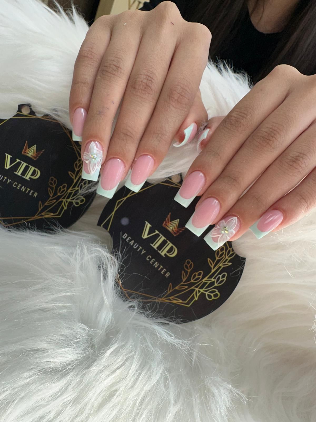 Pink nails with floral 3D design